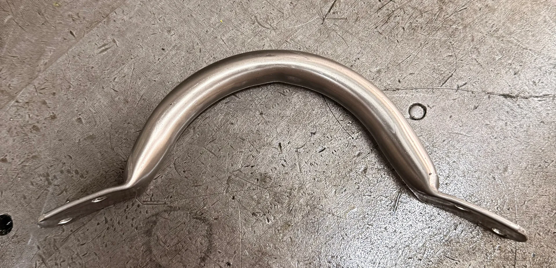 Detalle de pieza metálica de precisión fabricada por Tabomar